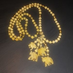 Antique bone carved elephant charm necklace